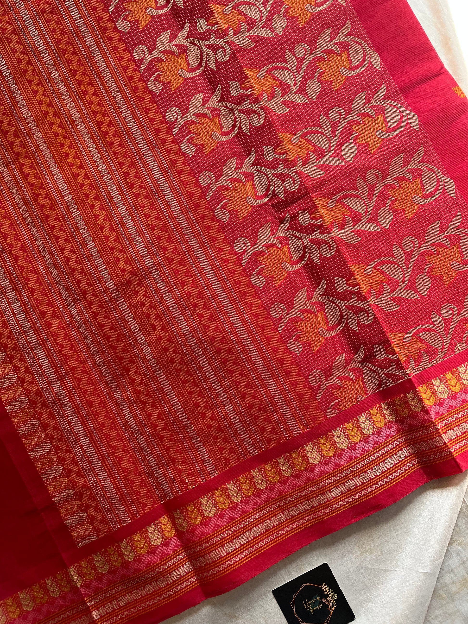 Red handloom Kanchi cotton saree with intricate multicoloured threadwork pallu and border – House of Thansha