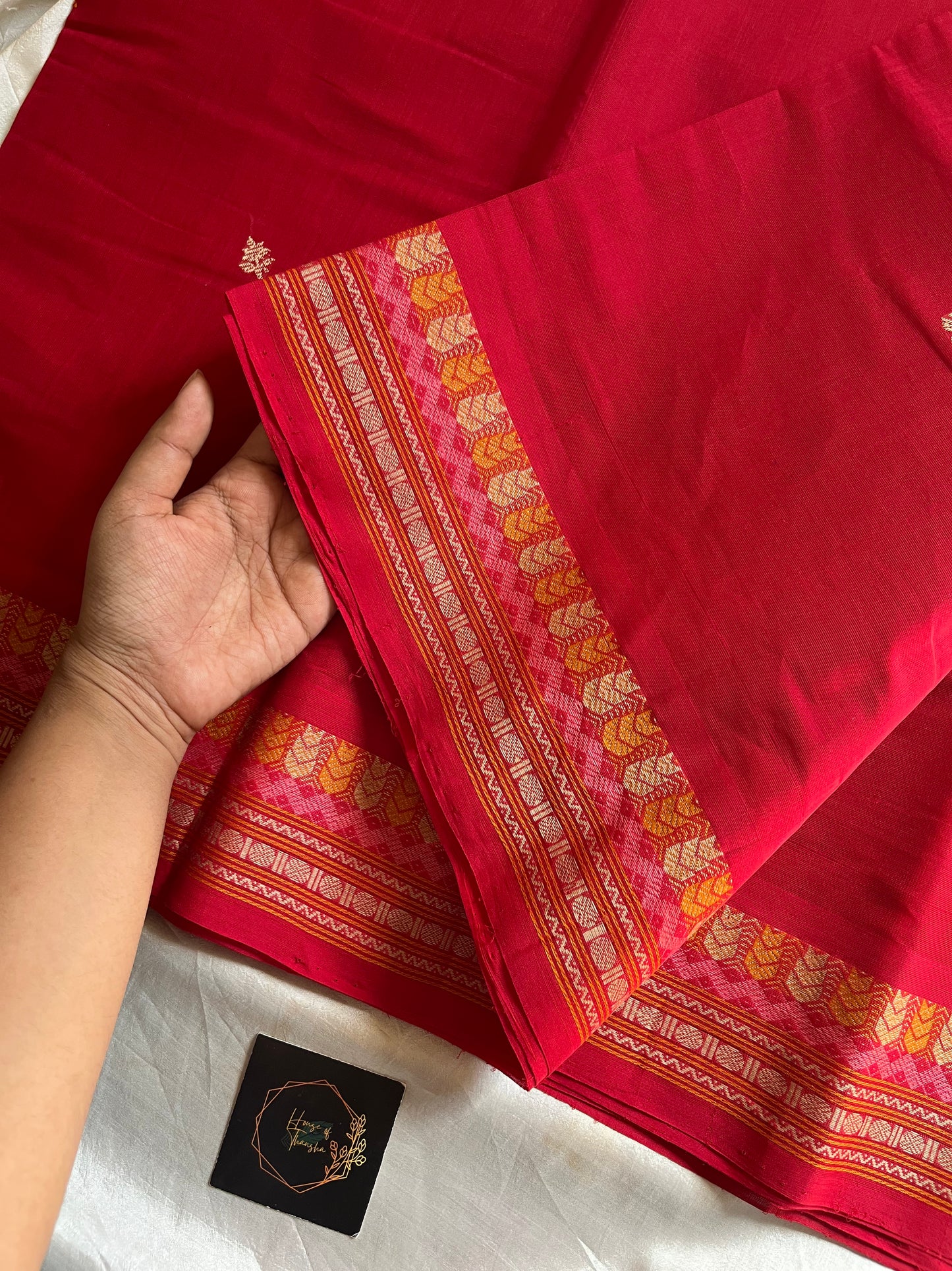 Red handloom Kanchi cotton saree with intricate multicoloured threadwork pallu and border – House of Thansha