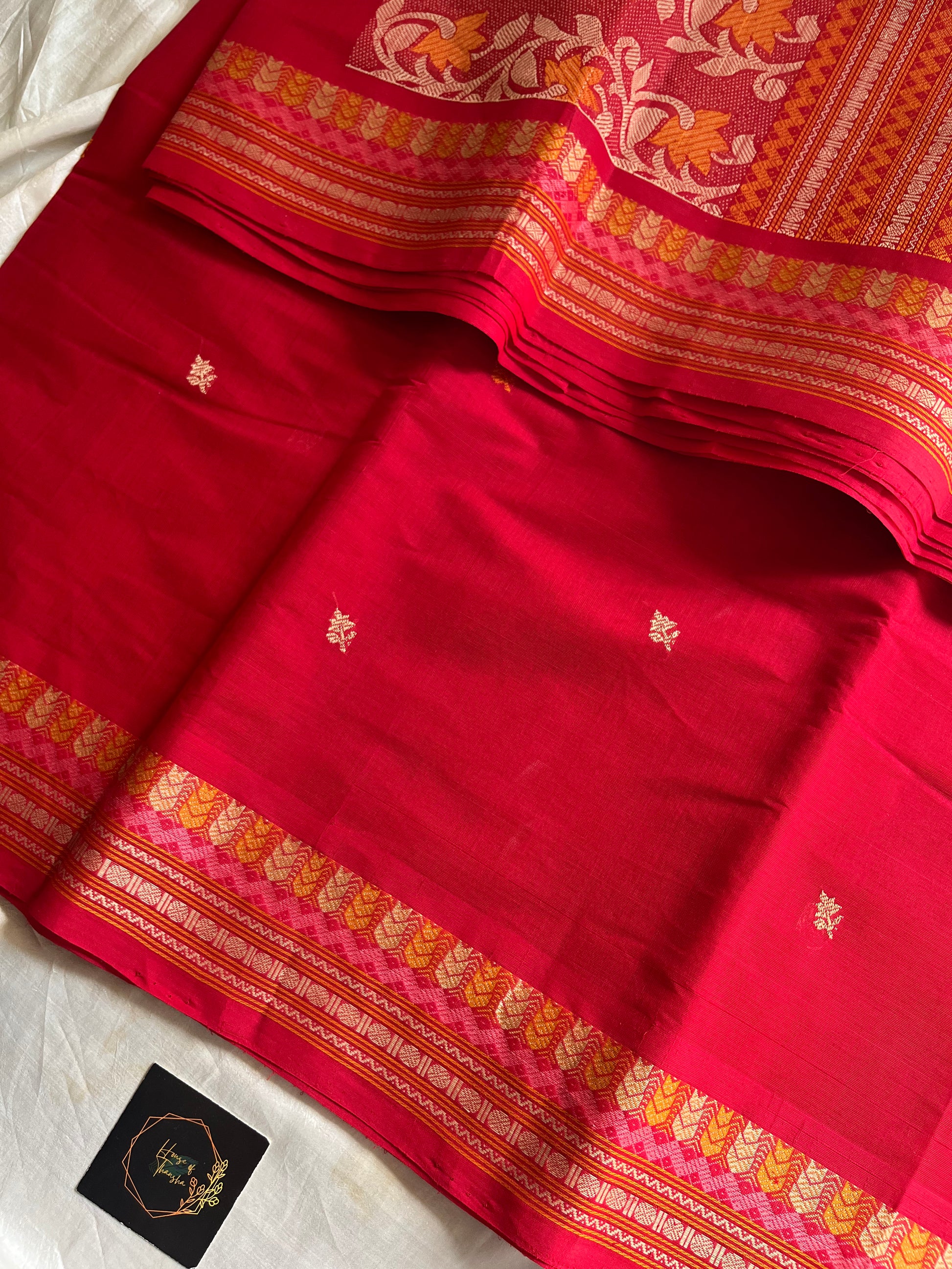 Red handloom Kanchi cotton saree with intricate multicoloured threadwork pallu and border – House of Thansha