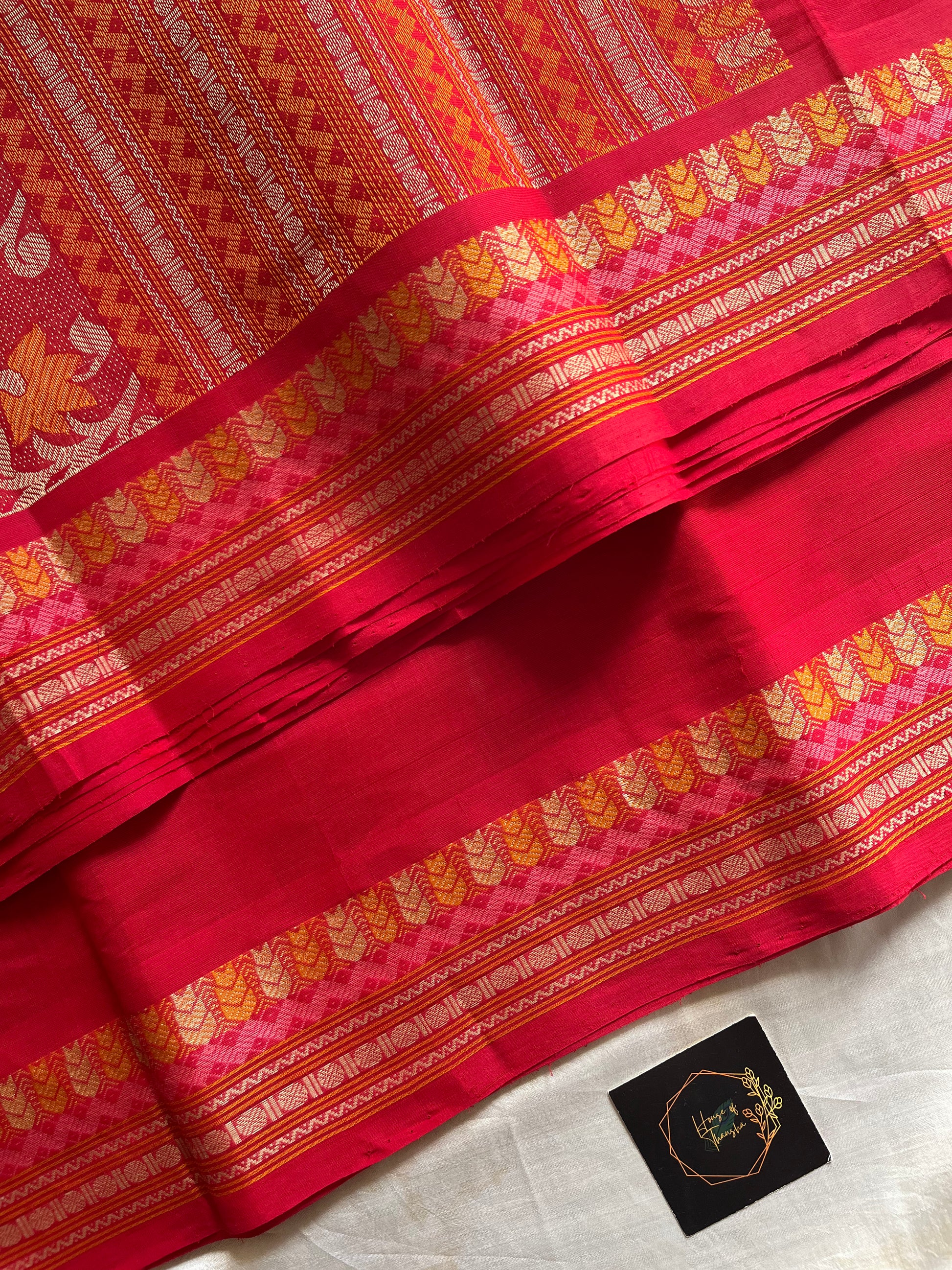 Red handloom Kanchi cotton saree with intricate multicoloured threadwork pallu and border – House of Thansha