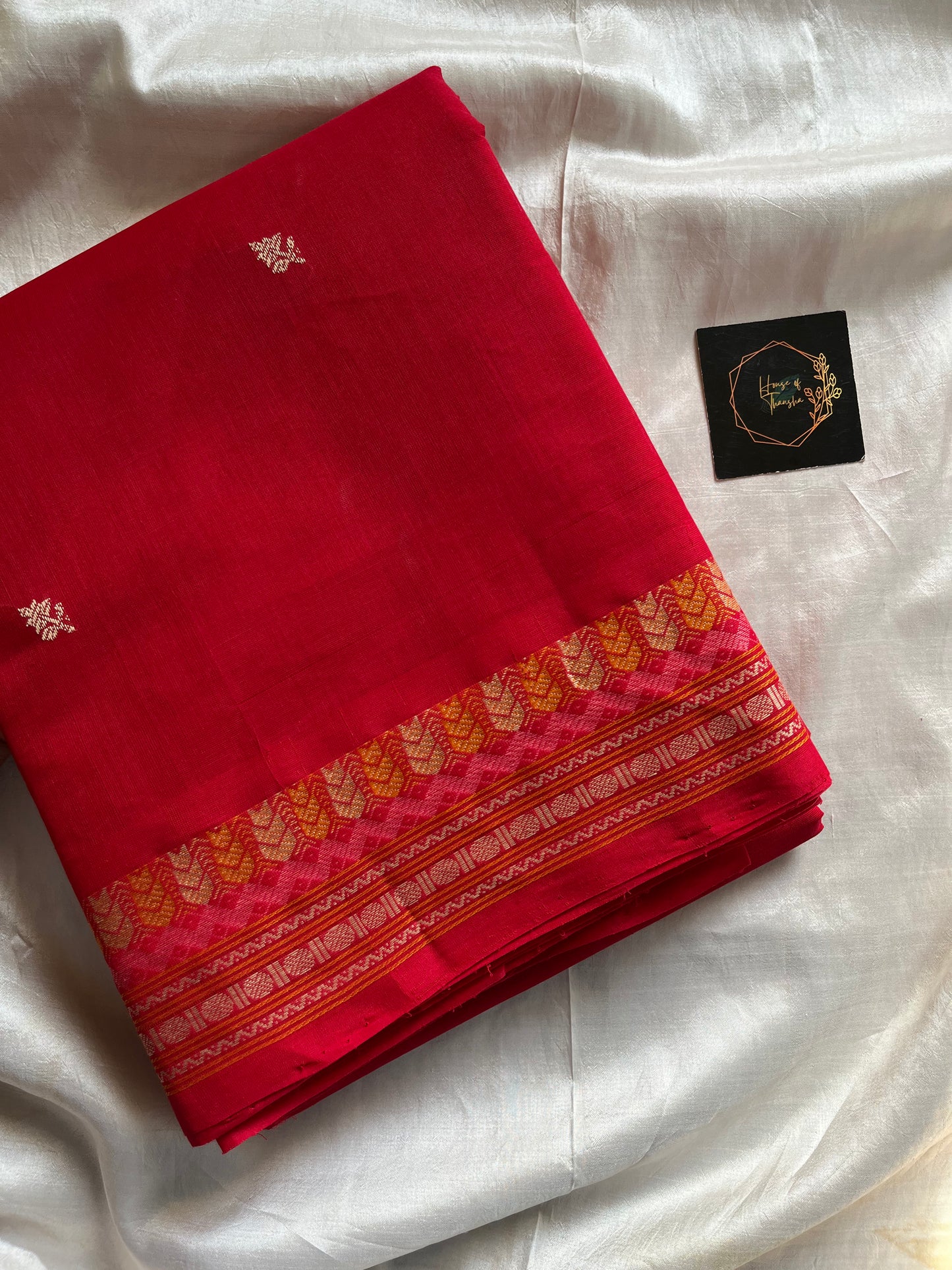 Red handloom Kanchi cotton saree with intricate multicoloured threadwork pallu and border – House of Thansha