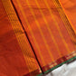 Subtle Weaves – Orange Kanchi Cotton Saree with Small Border