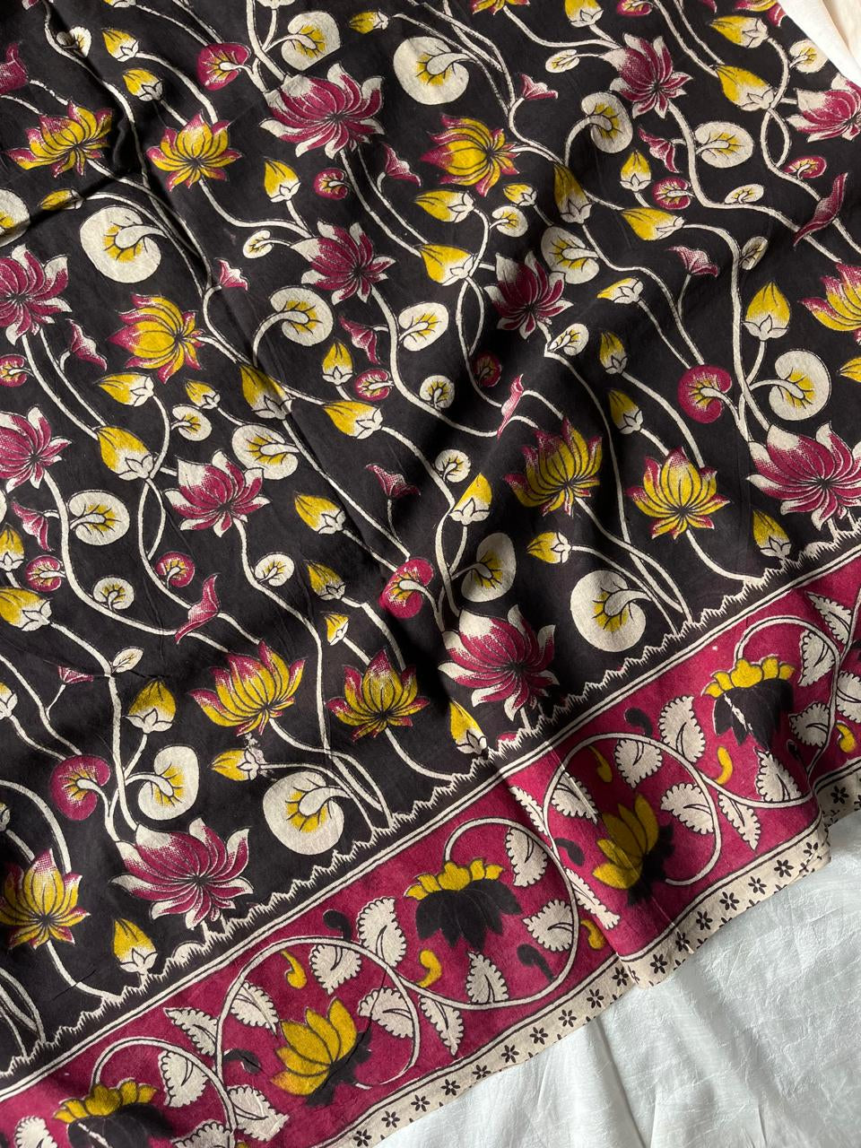 Black Kalamkari cotton saree with pen-drawn floral motifs – House of Thansha