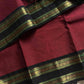 Maroon Kanchi cotton saree with subtle black golden zari border