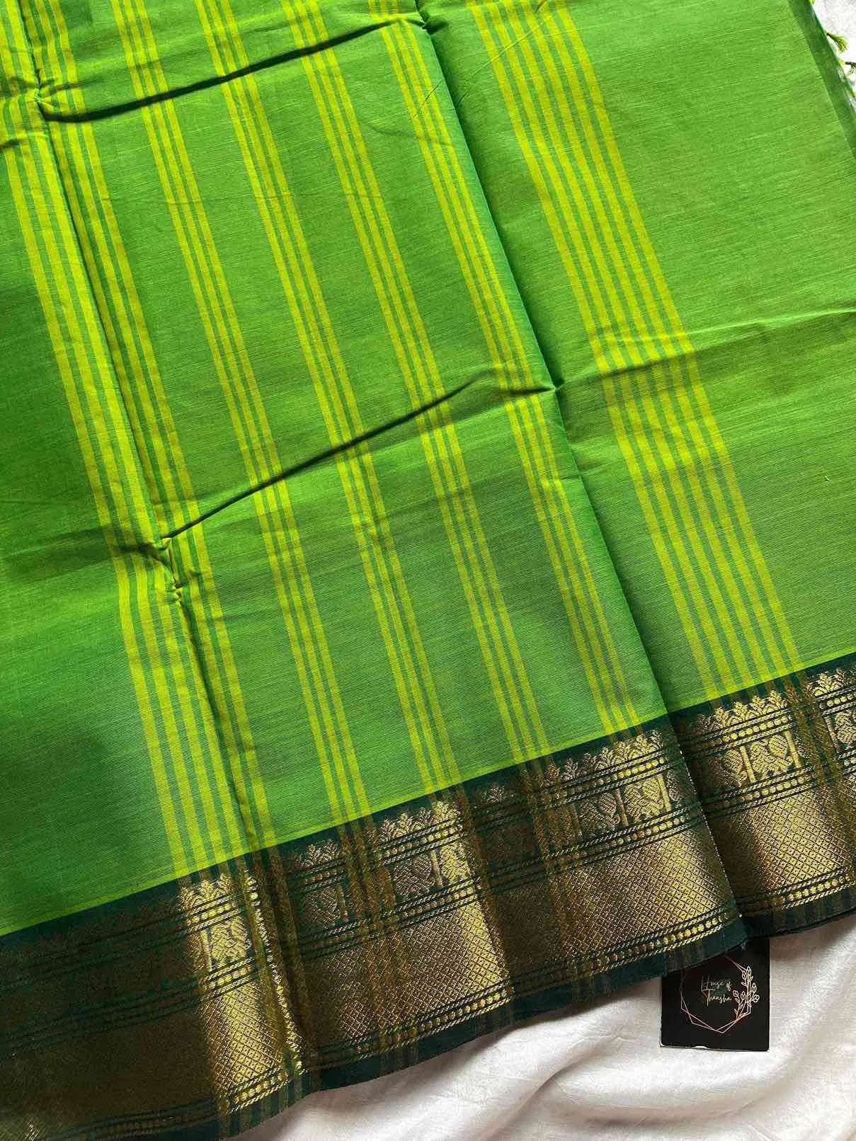 Green Kanchi cotton saree with subtle golden zari border - pallu