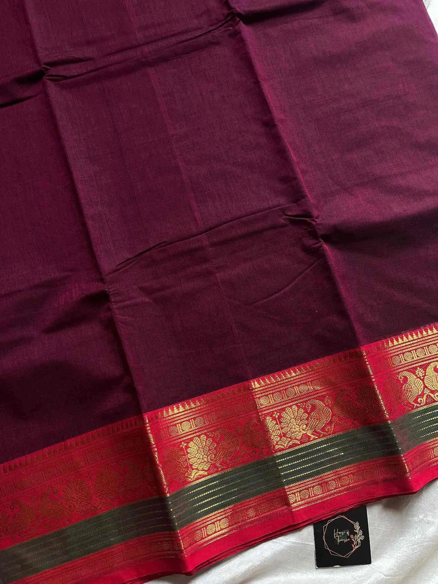 Pink infused maroon Kanchi cotton saree with subtle golden zari border – House of Thansha