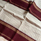 Pastel white Korvai Kattam Chettinadu cotton saree with maroon border – House of Thansha