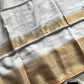 White Khadi Cotton Saree with matte golden border and running blouse, soft breathable fabric
