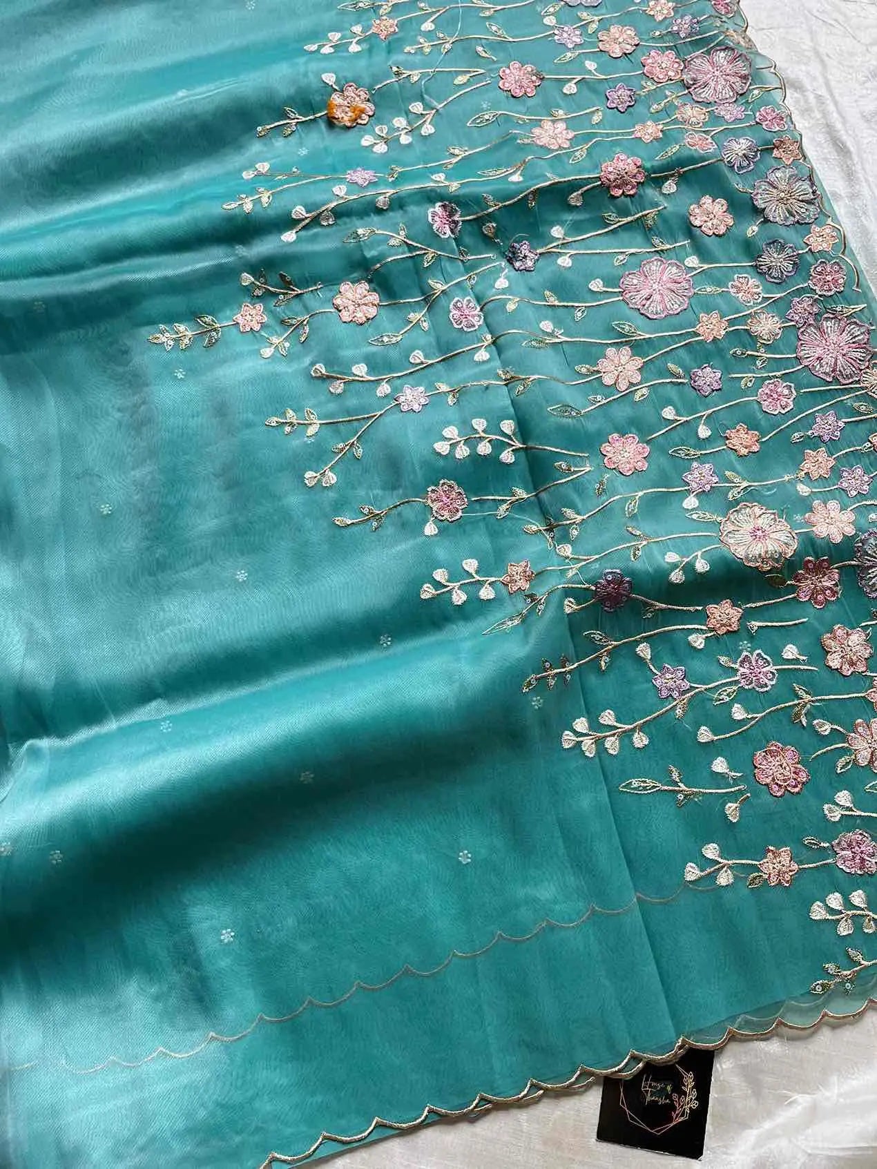 Soft organza saree with floral hand embroidery, flowy non-stiff drape by House of Thansha