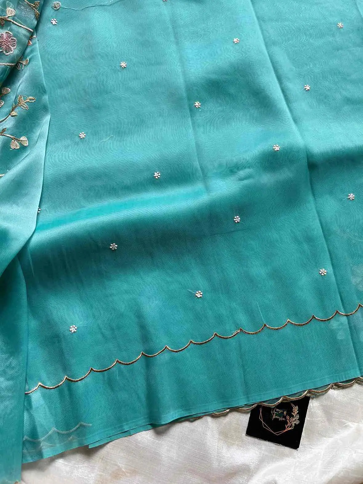 Soft organza saree with floral hand embroidery, flowy non-stiff drape by House of Thansha