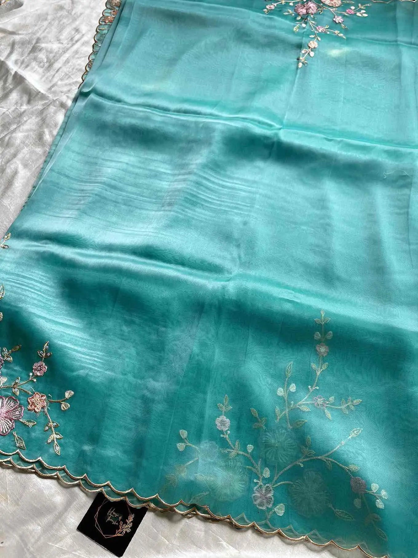 Soft organza saree with floral hand embroidery, flowy non-stiff drape by House of Thansha