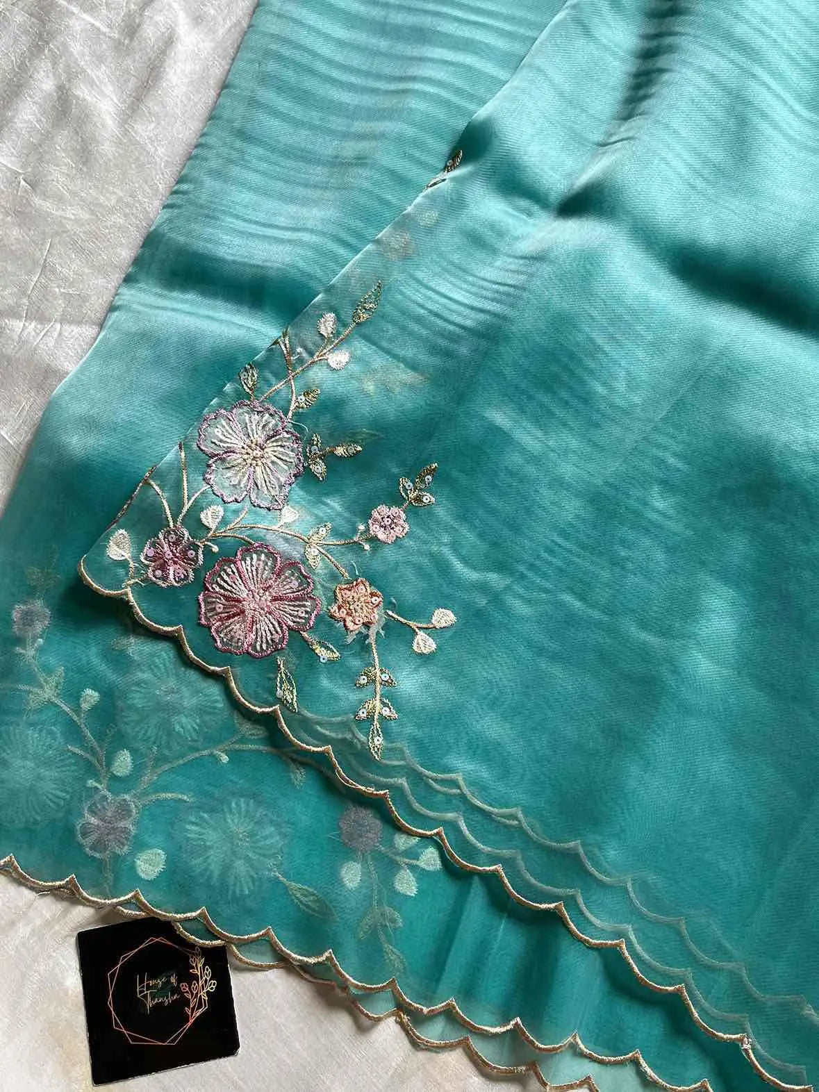 Soft organza saree with floral hand embroidery, flowy non-stiff drape by House of Thansha