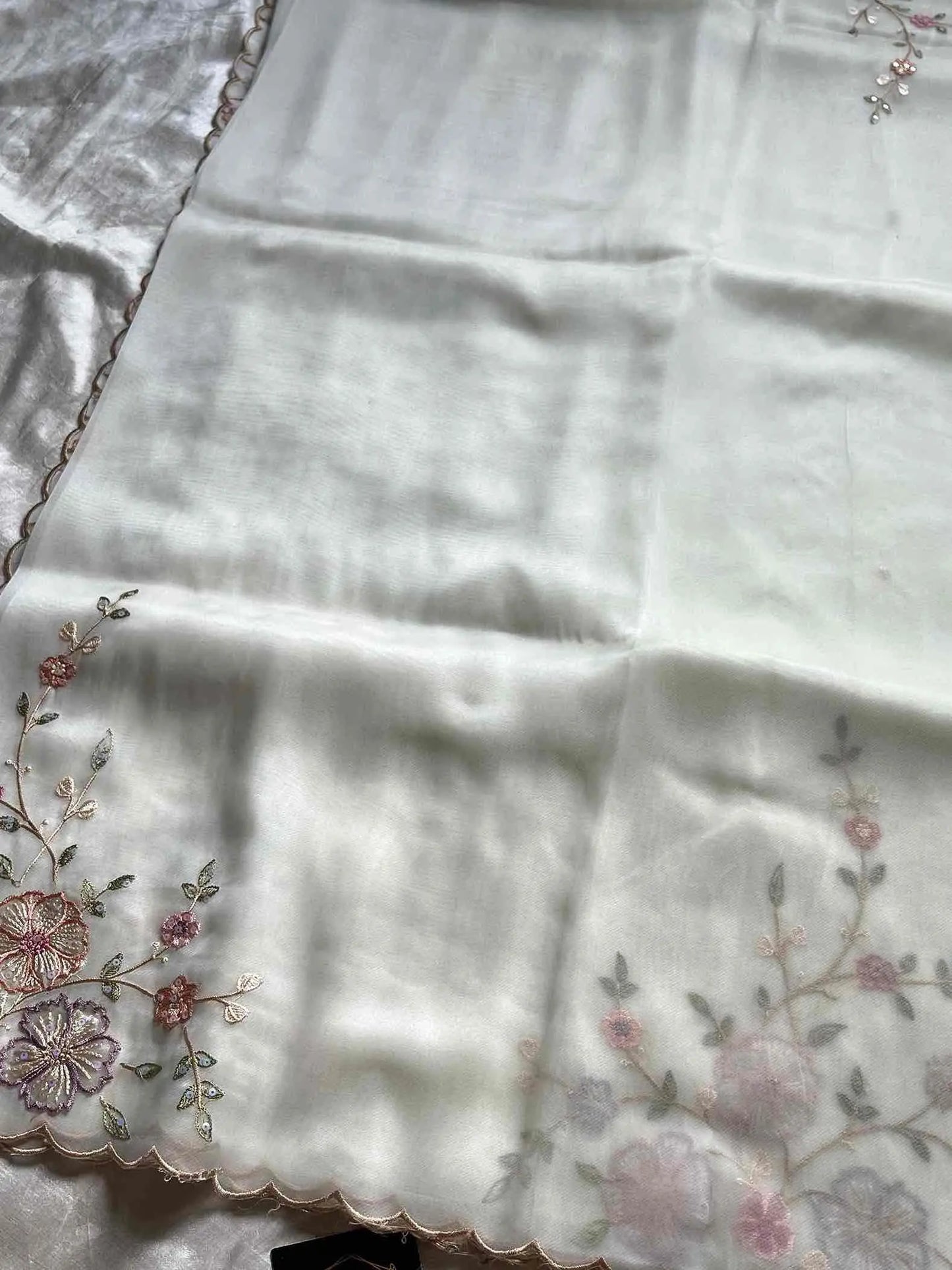 Soft organza saree with floral hand embroidery, flowy non-stiff drape by House of Thansha