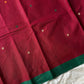 Maroon handloom Kanchi cotton saree with handwoven buttas, subtly woven pallu