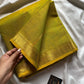 Yellowish green Chettinadu cotton saree with small golden zari border and zari motifs in body, 6 meters