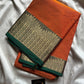 Orange Chettinadu cotton saree with subtle weave and green border, 6 meters