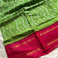 Green Atchu Kattu Sungudi cotton saree with pink border