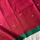 Maroon handloom Kanchi cotton saree with handwoven buttas, subtly woven pallu