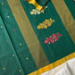 Green handloom Kanchi cotton saree with handwoven buttas, subtly woven pallu