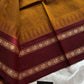 Mustard brown Chettinadu cotton saree with thread-woven korvai border and running blouse