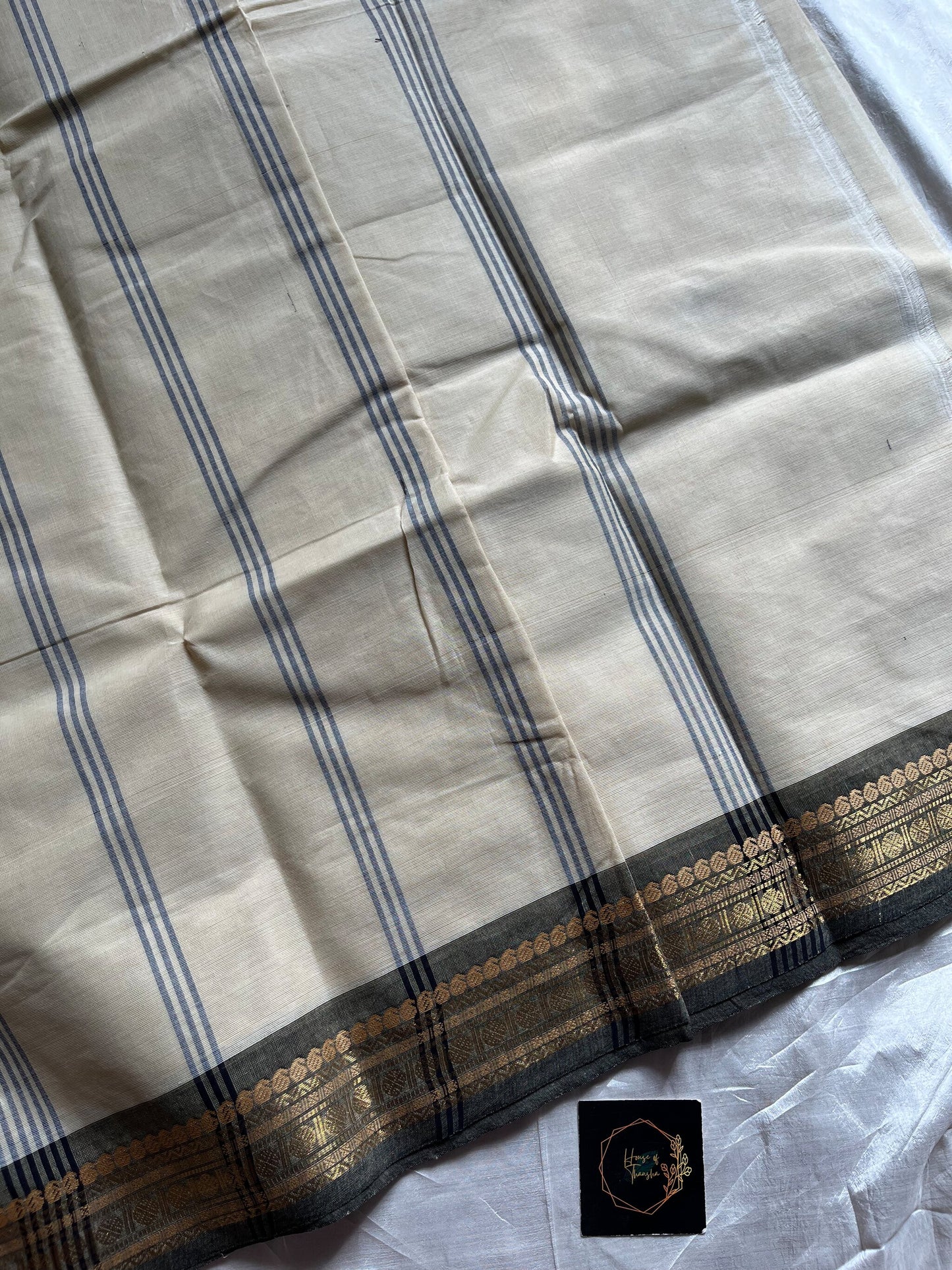 White Chettinadu cotton saree with plain body and zari border