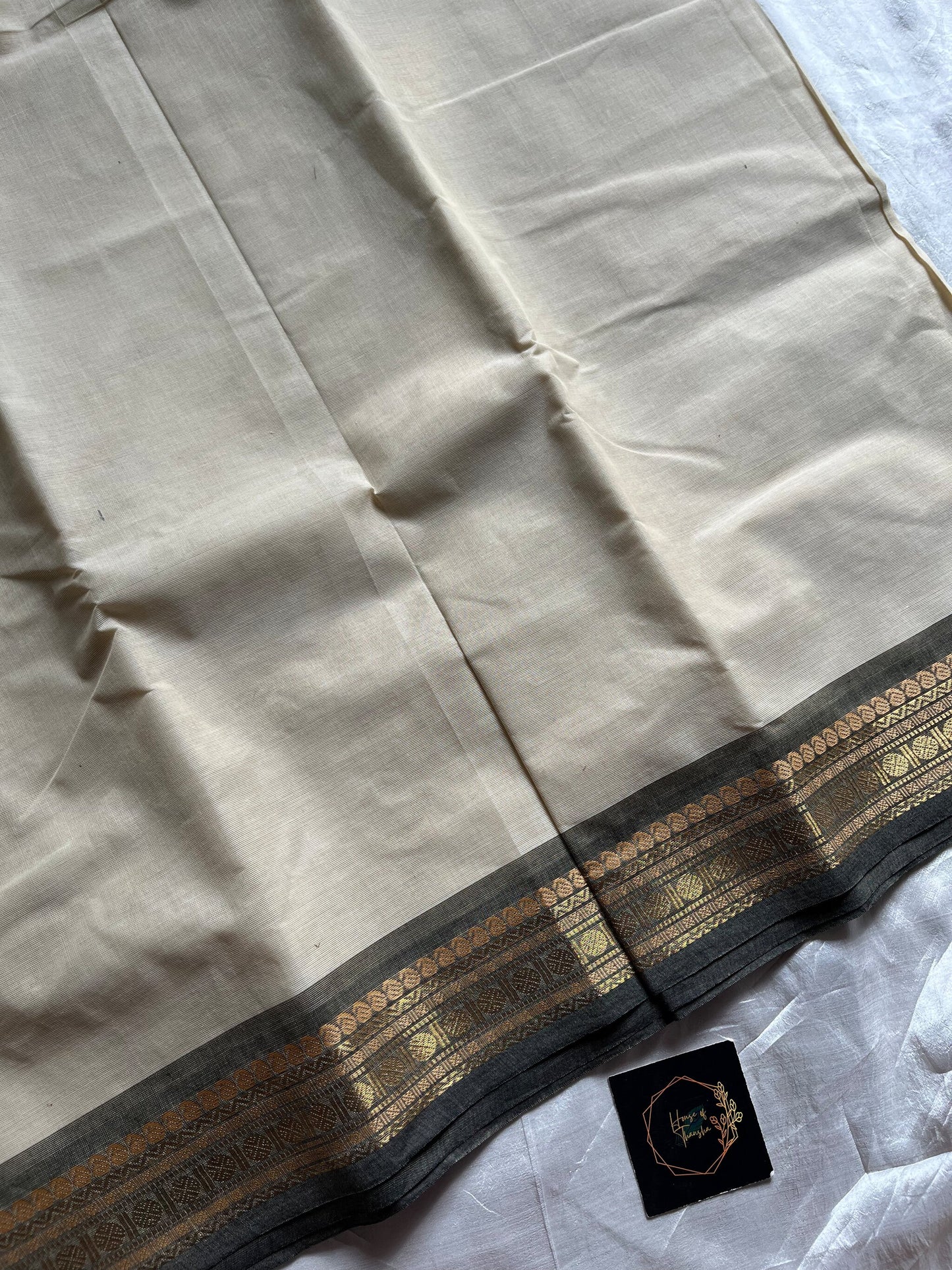 White Chettinadu cotton saree with plain body and zari border