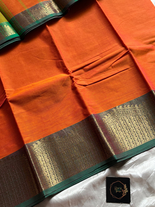 Orange Chettinadu cotton saree with subtle weave and green border, 6 meters