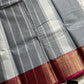 Grey Chettinadu cotton saree with subtle weave and pink border
