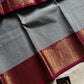 Grey Chettinadu cotton saree with subtle weave and pink border