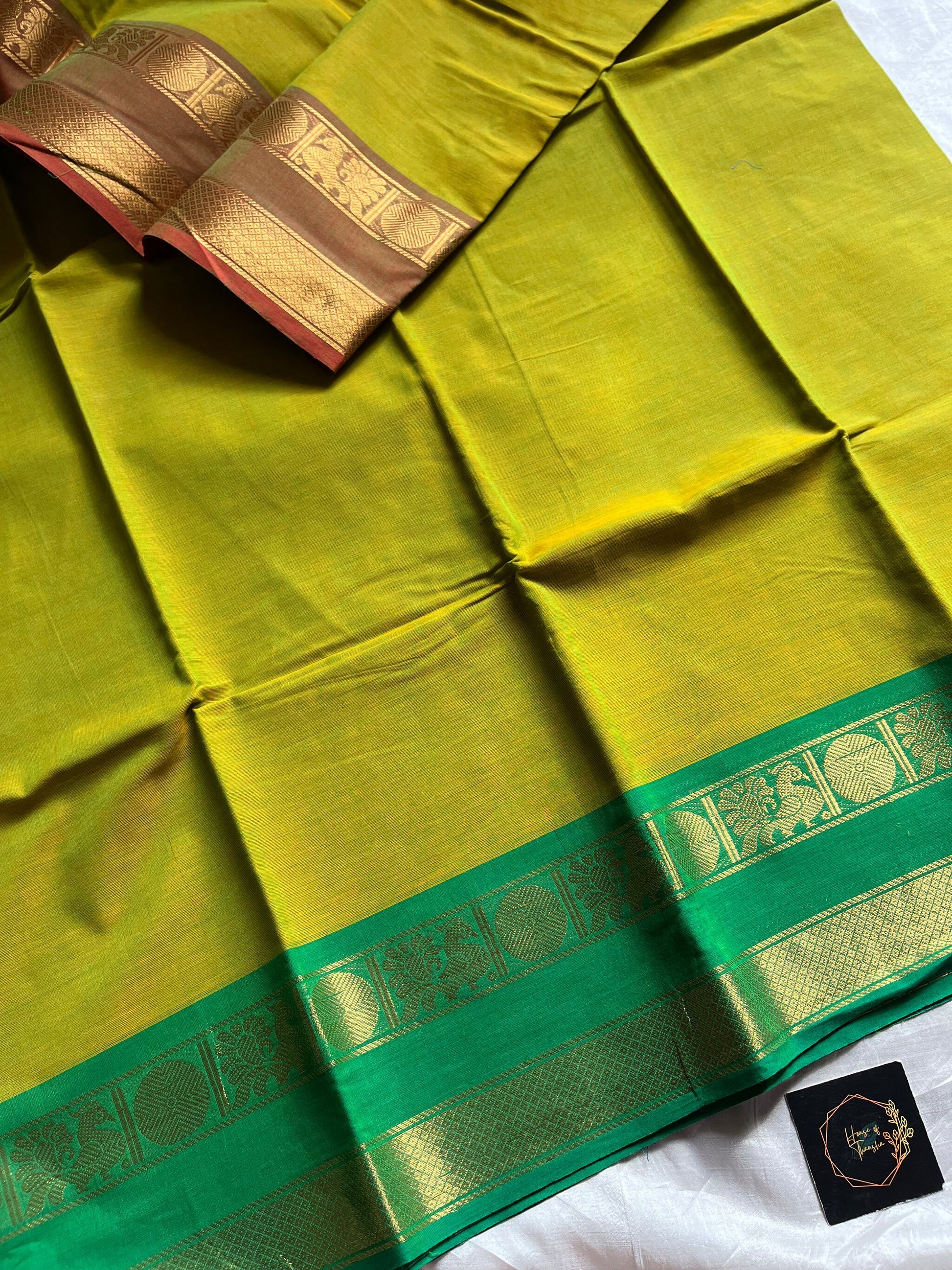 Green Chettinadu cotton saree with subtle weave and Ganga Jamuna border