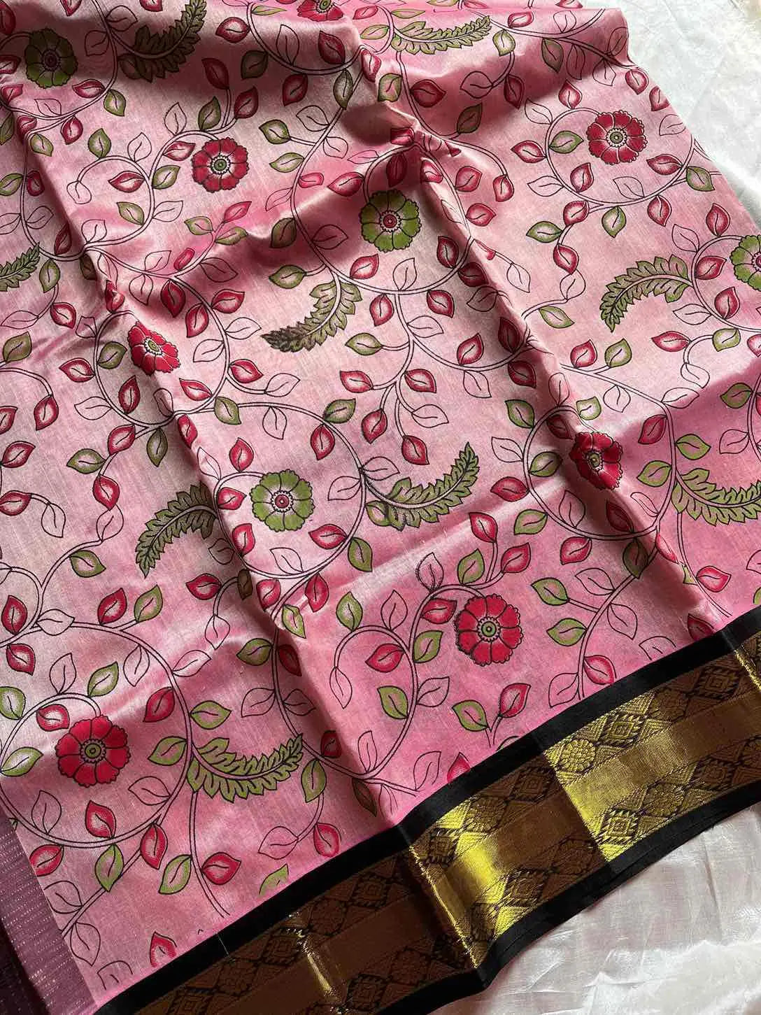 Pastel pink Kanchi silk cotton saree with black border and floral patterns – House of Thansha
