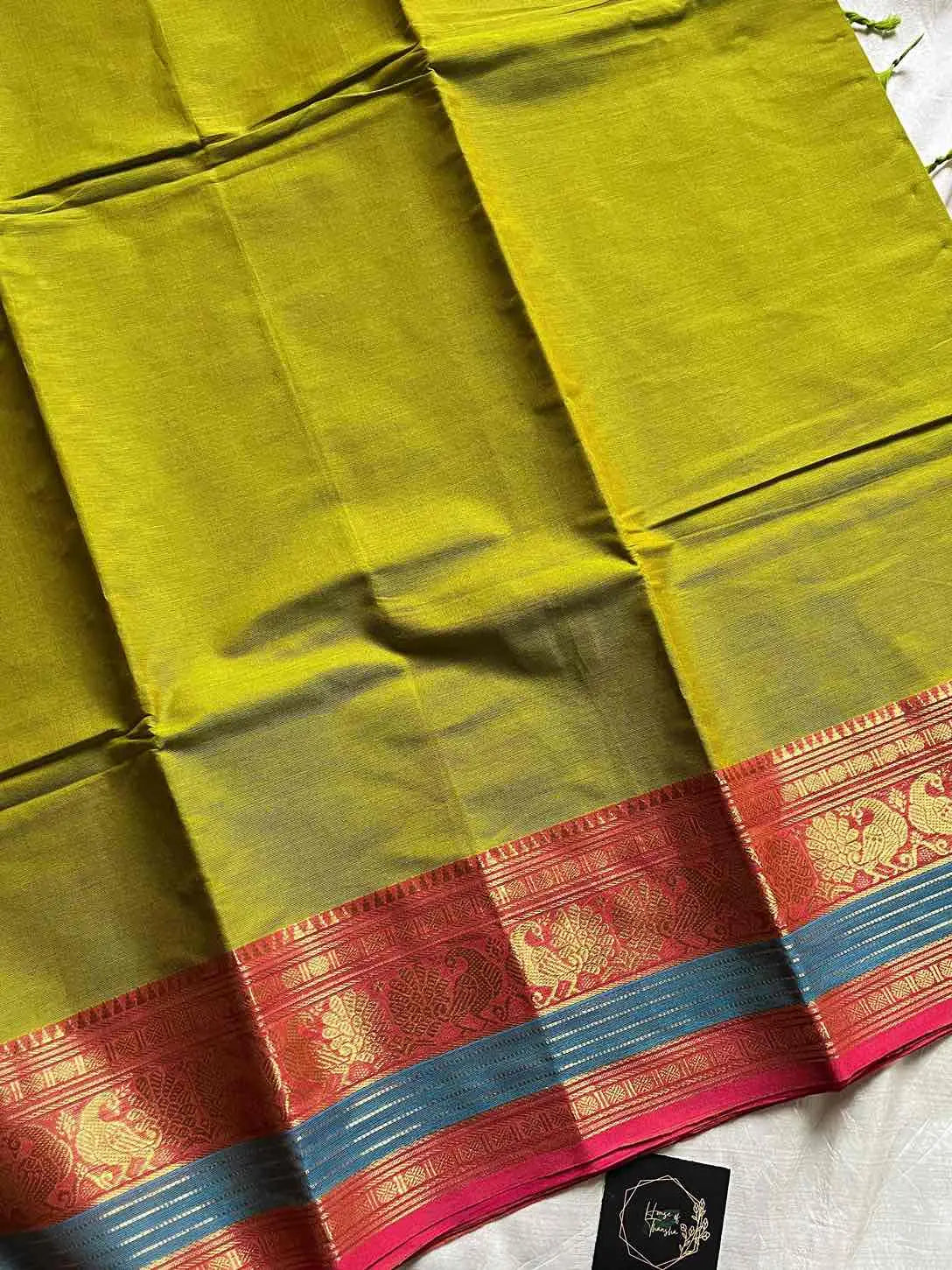 Green Kanchi cotton saree with subtle golden zari border – House of Thansha