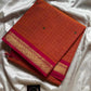 Kattam series - Orange Kanchi cotton checked saree with contrast border.