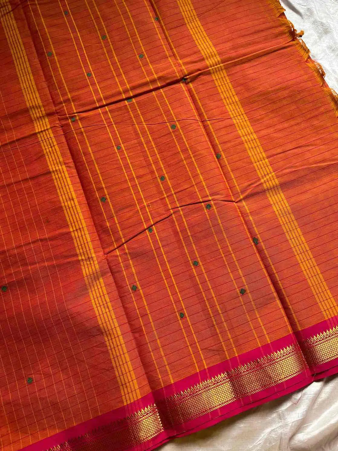 Kattam series - Orange Kanchi cotton checked saree with contrast border.
