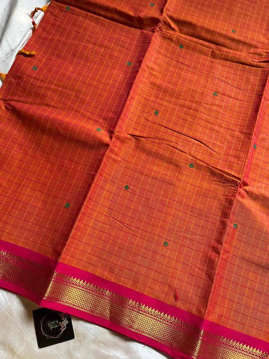 Kattam series - Orange Kanchi cotton checked saree with contrast border.