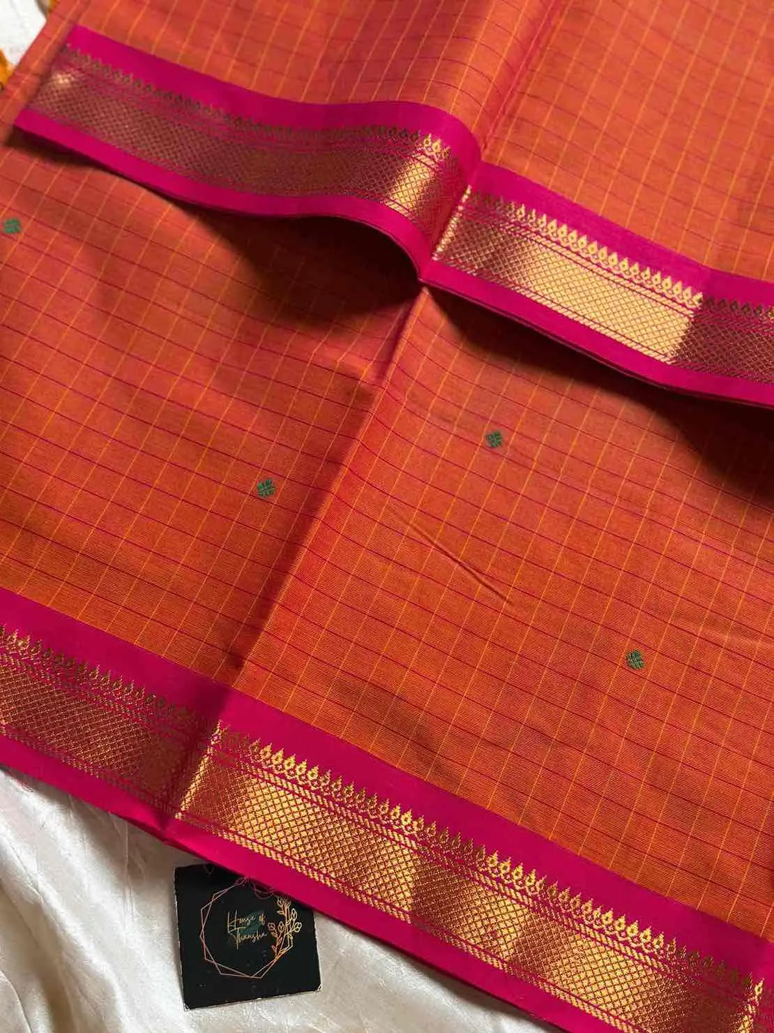 Kattam series - Orange Kanchi cotton checked saree with contrast border.